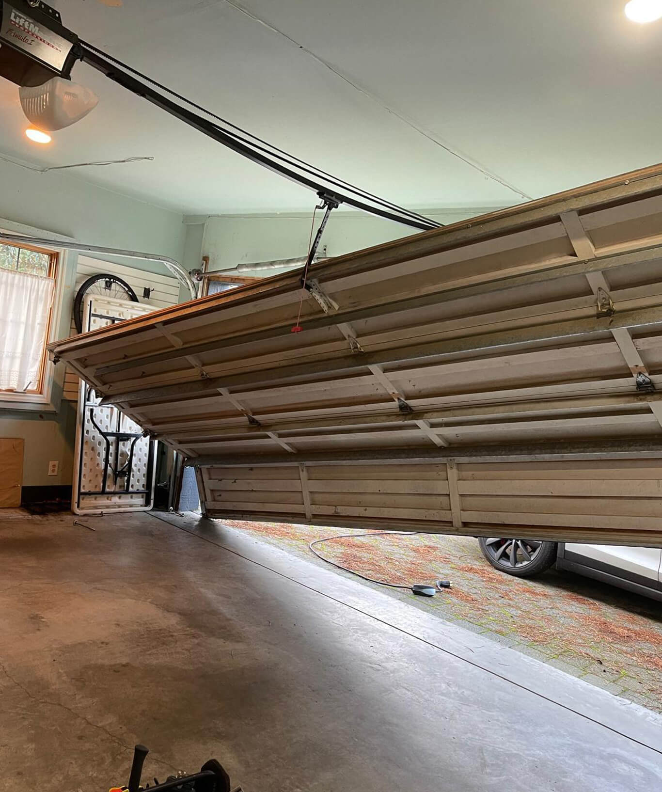 Garage Door Off track Repair